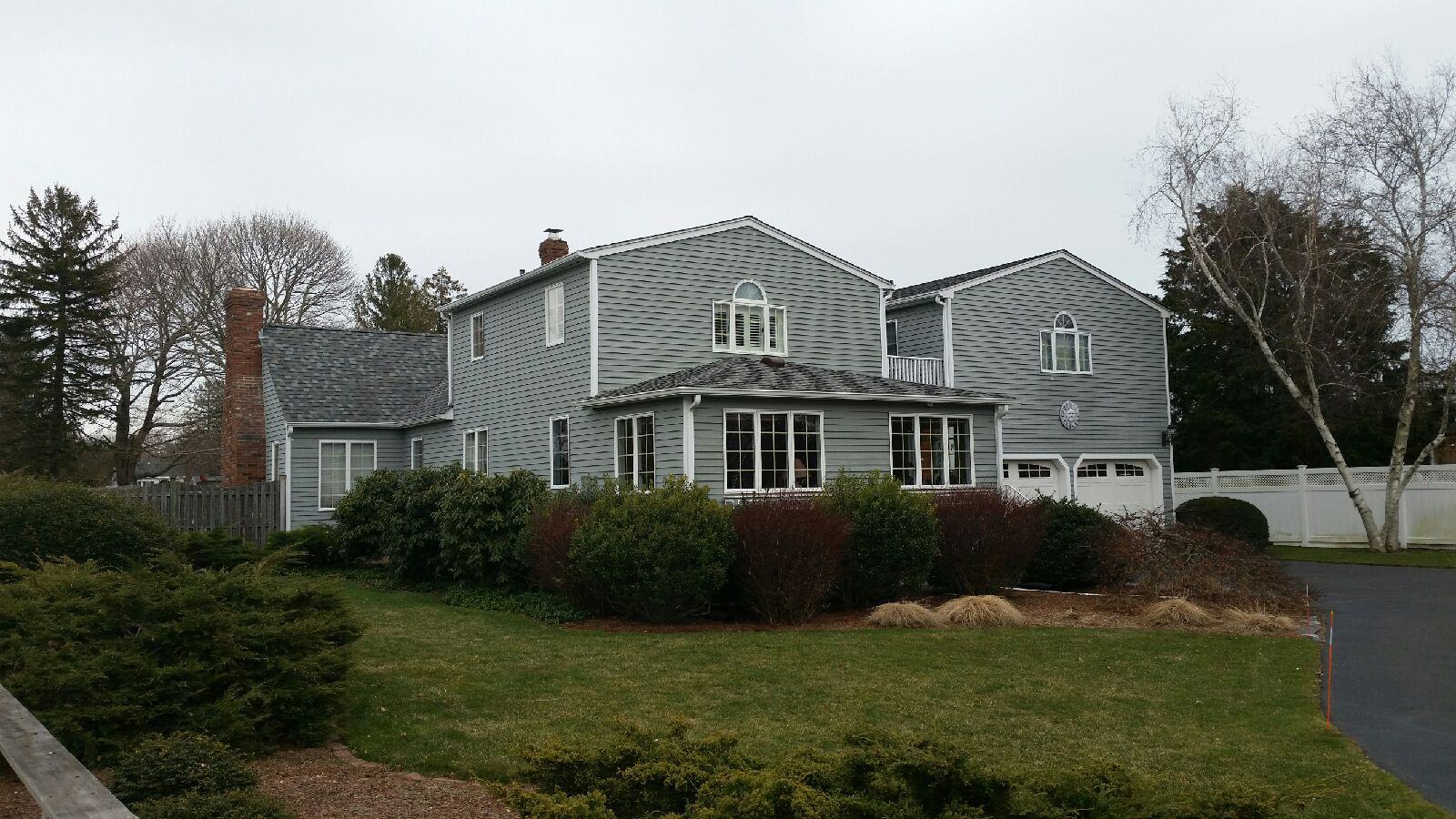 new home with a nice roof and siding
